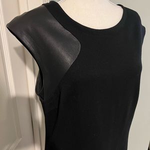Trina Turk Black dress with leather shoulder detail. Size 10